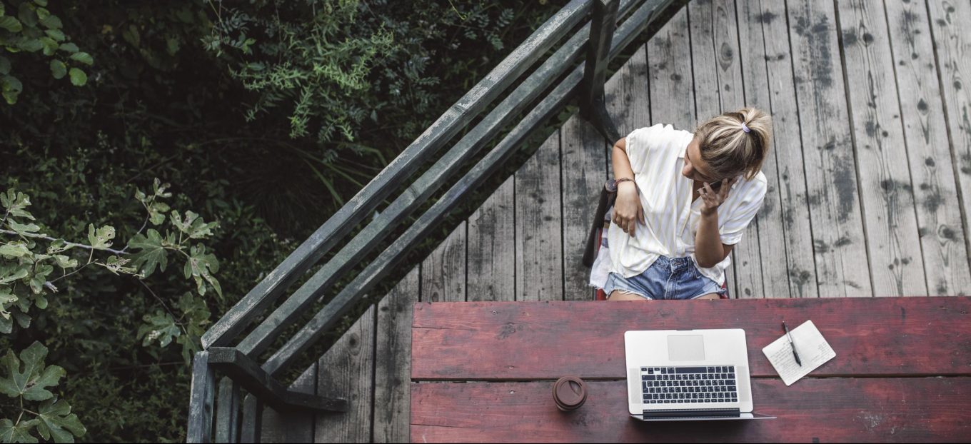 A Woman Freelancer Working on a Vacation